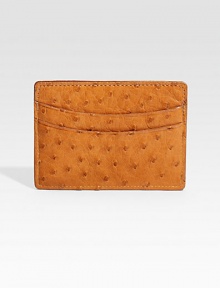 EXCLUSIVELY OURS. We rethought the classic card case in remarkable ostrich leather. One bill compartment Two card slots 4 X 3 Imported EXCLUSIVELY OURS. We rethought the classic card case in remarkable ostrich leather. One bill compartment Two card slots 4 X 3 Imported