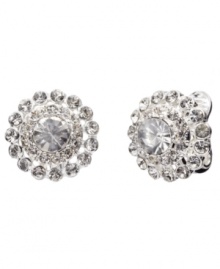 Simple yet sophisticated. Glittering glass accents and crystals shine brightly on these stunning stud earrings from Monet. Crafted in silver tone mixed metal, they're an elegant enhancement to your look for either daytime or evening. Approximate diameter: 3/4 inch.