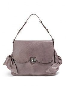 THE LOOKAdjustable shoulder strapCurvy flap with turnlock closureSide bow detailsProtective metal feetOne inside zip pocketTwo inside open pocketsInside logo detailTHE MEASUREMENTShoulder strap, 8 drop17W X 10H X 5½DTHE MATERIALLeatherFully linedORIGINImported THE LOOKAdjustable shoulder strapCurvy flap with turnlock closureSide bow detailsProtective metal feetOne inside zip pocketTwo inside open pocketsInside logo detailTHE MEASUREMENTShoulder strap, 8 drop17W X 10H X 5½DTHE MATERIALLeatherFully linedORIGINImported