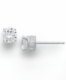 Diamond stud earrings have never sparkled so bright. This unique style features a round-cut diamond at center with a row of round-cut diamonds in the post (1/2 ct. t.w.). Four-prong setting crafted in 14k white gold. Approximate diameter: 3-4/5 mm. Diamond stud earrings have never sparkled so bright. This unique style features a round-cut diamond at center with a row of round-cut diamonds in the post (1/2 ct. t.w.). Four-prong setting crafted in 14k white gold. Approximate diameter: 3-4/5 mm.