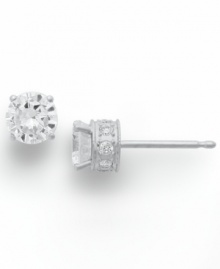 Diamond stud earrings have never sparkled so bright. This unique style features a round-cut diamond at center with a row of round-cut diamonds in the post (1/2 ct. t.w.). Four-prong setting crafted in 14k white gold. Approximate diameter: 3-4/5 mm.