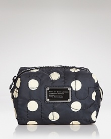 MARC BY MARC JACOBS' polka-dot printed cosmetic case is the perfect spot to stash it-girlie products. MARC BY MARC JACOBS' polka-dot printed cosmetic case is the perfect spot to stash it-girlie products.