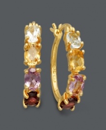 Introduce new color to your wardrobe with these clever hoops. Victoria Townsend earrings feature oval-cut amethyst (9/10 ct. t.w.), blue topaz (1-1/10 ct. t.w.), garnet (1-1/10 ct. t.w.) and citrine (9/10 ct. t.w.) in an 18k gold over sterling silver setting. Approximate diameter: 1 inch. Introduce new color to your wardrobe with these clever hoops. Victoria Townsend earrings feature oval-cut amethyst (9/10 ct. t.w.), blue topaz (1-1/10 ct. t.w.), garnet (1-1/10 ct. t.w.) and citrine (9/10 ct. t.w.) in an 18k gold over sterling silver setting. Approximate diameter: 1 inch.