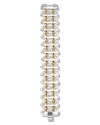 On the right side of classic, Lauren by Ralph Lauren's multi-tone link bracelet is a bold choice layered over a crisp neckline or cocktail dress.