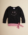 Tied jauntily to the side, this super sweet sweatshirt flaunts a rhinestone-studded smiley face and crew neckline.