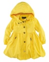 A pretty mockneck raincoat is smartly designed with an attached hood for extra protection from the elements.