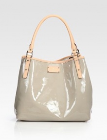 Sleek patent leather defines this roomy carryall finished with contrast leather trim.Shoulder straps, 7½ drop Magnetic snap closure Protective metal feet One inside zip pocket Two inside open pockets Cotton lining 13½W X 11H X 7D Imported Sleek patent leather defines this roomy carryall finished with contrast leather trim.Shoulder straps, 7½ drop Magnetic snap closure Protective metal feet One inside zip pocket Two inside open pockets Cotton lining 13½W X 11H X 7D Imported