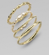 From the Glamazon Collection. A striking bangle, simply formed of twisted 18k gold with a rich hammered finish. 18k yellow gold Diameter, about 2½ Width, about ¼ Made in ItalyPlease note: Bracelets sold separately. 