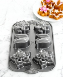 Dress up your next batch of cupcakes or muffins by baking with a floral bouquet pan that transfers intricate details to your tasty treats and brings your next party into full bloom. 10-year warranty. Dress up your next batch of cupcakes or muffins by baking with a floral bouquet pan that transfers intricate details to your tasty treats and brings your next party into full bloom. 10-year warranty.