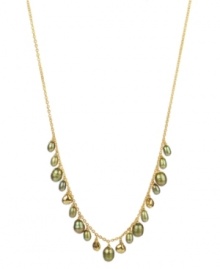 Let it glow. Pretty green-hued cultured freshwater pearls (5-9 mm) combine with glittering pyrite (4-3/4 ct. t.w.) for a luminous look on this 18k gold over sterling silver necklace. Approximate length: 17 inches.