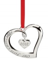 Make it official. A beauty in polished silver plate, this 2012 Lenox ornament commemorates a romantic first – Christmas together! Featuring an open heart with another danging within.