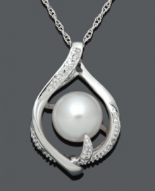 An elegant accent piece. This timeless style highlights a pretty, diamond-accented teardrop cradling a cultured freshwater pearl (8-9 mm). Setting and chain crafted in sterling silver. Approximate length: 18 inches. Approximate drop: 1 inch. An elegant accent piece. This timeless style highlights a pretty, diamond-accented teardrop cradling a cultured freshwater pearl (8-9 mm). Setting and chain crafted in sterling silver. Approximate length: 18 inches. Approximate drop: 1 inch.