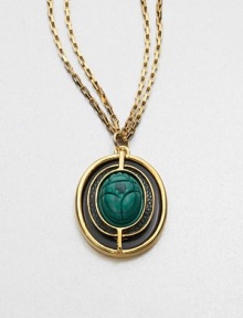 A malachite scarab pendant accented with lizard skin on a double box link chain. MalachiteLizard skinGoldtone brassLength, about 36Pendant size, about 1Lobster clasp closureMade in USA A malachite scarab pendant accented with lizard skin on a double box link chain. MalachiteLizard skinGoldtone brassLength, about 36Pendant size, about 1Lobster clasp closureMade in USA