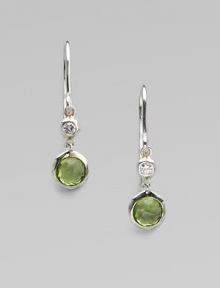 From the Silver Rain Collection. A lovely peridot, richly faceted in a modern sterling silver setting, is capped by one shimmering diamond.Diamonds, .07 tcw PeridotSterling silverDrop, about 1Ear wireImported From the Silver Rain Collection. A lovely peridot, richly faceted in a modern sterling silver setting, is capped by one shimmering diamond.Diamonds, .07 tcw PeridotSterling silverDrop, about 1Ear wireImported
