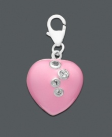 You can never go wrong with a little pink. Add sparkle and color with this bold pink heart charm with crystal accents. Set in sterling silver with a lobster claw clasp. Approximate diameter: 1/2 inch. You can never go wrong with a little pink. Add sparkle and color with this bold pink heart charm with crystal accents. Set in sterling silver with a lobster claw clasp. Approximate diameter: 1/2 inch.