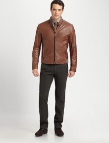 Ribbed knit banding, uniquely placed at the collar, shoulder and hem enhance the blousy effect of this jacket rendered in luxuriously soft lambskin leather.Two-way zip frontStand collarSide slash pocketsRibbed knit collar, shoulder and hem detailFully linedAbout 26 from shoulder to hemLeatherDry cleanImported Ribbed knit banding, uniquely placed at the collar, shoulder and hem enhance the blousy effect of this jacket rendered in luxuriously soft lambskin leather.Two-way zip frontStand collarSide slash pocketsRibbed knit collar, shoulder and hem detailFully linedAbout 26 from shoulder to hemLeatherDry cleanImported