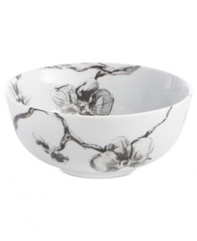 Compose a striking arrangement with the Black Orchid bowl by Michael Aram. Fine white Limoges porcelain flourishes under a dark watercolor motif inspired by foliage from around the world. Compose a striking arrangement with the Black Orchid bowl by Michael Aram. Fine white Limoges porcelain flourishes under a dark watercolor motif inspired by foliage from around the world.