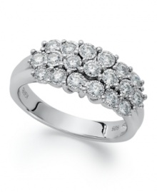 Effervescent and luminous, this sparkling three-row design highlights round-cut diamonds (1/2 ct. t.w.) in sterling silver. Size 7. Effervescent and luminous, this sparkling three-row design highlights round-cut diamonds (1/2 ct. t.w.) in sterling silver. Size 7.