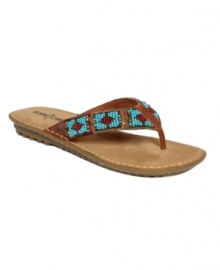 Bring easy Southwestern-inspired style to your summer looks with the colorful beading of the ultra-comfortable Marin thong sandals by Minnetonka.