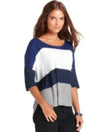 Colorblocked stripes make a big impact on a chic, relaxed silhouette in this petite look from Calvin Klein Jeans. Pair it with skinny jeans for an of-the-moment outfit.