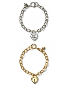 Just what she wants this year... a Juicy Couture starter bracelet that comes the perfect first charm:a puffy heart lock. Shown with iconic Juicy script and glass crystal accents.