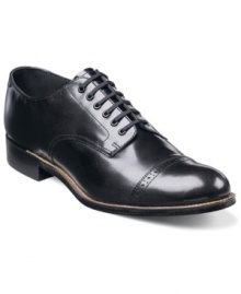 Keep it fun, keep it classic. This traditional pair of cap-toe oxford men's dress shoes makes all the right moves. Imported.