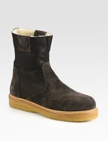 Elegant suede design, with contrasting rubber sole and cozy shearling lining.Leather upperRubber soleMade in Italy Elegant suede design, with contrasting rubber sole and cozy shearling lining.Leather upperRubber soleMade in Italy