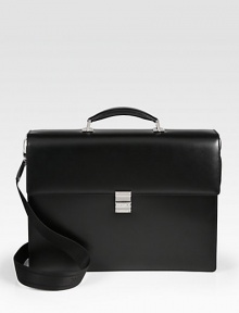Double-gusset briefcase with detachable shoulder strap, constructed from smooth leather with a secure combination lock and stainless steel metal accents for a shiny finish.Top handleFlap closure with lockAdjustable shoulder strapLeather16½W x 12½H x 4¾DImported Double-gusset briefcase with detachable shoulder strap, constructed from smooth leather with a secure combination lock and stainless steel metal accents for a shiny finish.Top handleFlap closure with lockAdjustable shoulder strapLeather16½W x 12½H x 4¾DImported