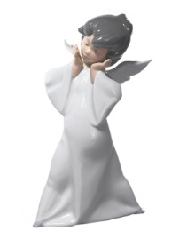 A guardian angel from Lladro, this gentle cherub wears a white robe and wondrous expression that puts everyone at ease. A guardian angel from Lladro, this gentle cherub wears a white robe and wondrous expression that puts everyone at ease.