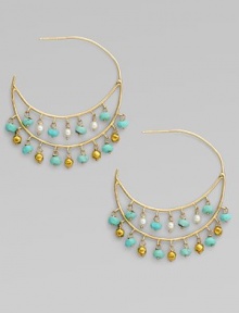 Delicate double hoops dangle tiny beads of turquoise, cultured pearls and 18k gold in this delightful design.Turquoise Cultured pearls 18k and 14k yellow gold Diameter, about ½ Post back Imported Delicate double hoops dangle tiny beads of turquoise, cultured pearls and 18k gold in this delightful design.Turquoise Cultured pearls 18k and 14k yellow gold Diameter, about ½ Post back Imported