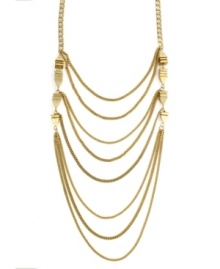 Take the layering trend to a whole new level. BCBGeneration's standout style features eight rows draped on top of one another for an ultra-chic look. Set in gold tone mixed metal. Approximate length: 16 inches. Approximate drop: 9-1/2 inches.