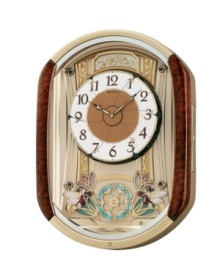 Old fashioned charm and chimes, by Seiko. Melodies in Motion musical wall clock features brown burled finish. On the hour, clock plays one of twelve melodies selected from two sets. First set composed of six traditional melodies; second set composed of Christmas melodies. Dial opens in six segments to reveal six rotating fairies and rotating pendulum made with 28 crystallized Swarovski elements. Includes volume control, demonstration button and light sensor. Measures approximately 20-7/8 inches by 15-1/4 inches by 4-1/2 inches. Old fashioned charm and chimes, by Seiko. Melodies in Motion musical wall clock features brown burled finish. On the hour, clock plays one of twelve melodies selected from two sets. First set composed of six traditional melodies; second set composed of Christmas melodies. Dial opens in six segments to reveal six rotating fairies and rotating pendulum made with 28 crystallized Swarovski elements. Includes volume control, demonstration button and light sensor. Measures approximately 20-7/8 inches by 15-1/4 inches by 4-1/2 inches.