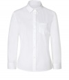 The classic white shirt gets a modern update with this boxy blouse from Jil Sander Navy - Small spread collar, three-quarter sleeves, front button placket, single chest pocket, oversized silhouette - Pair with cropped trousers, a leather jacket, and ballet flats