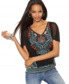 A soft silhouette combined with a bold print makes INC's petite top unique. Try it with your favorite jeans and an armful of bangles to heighten the exotic glamour!