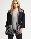 Quite possibly the most exquisite layering piece around, this cotton cardigan features striking embroidery. Its timeless kimono sleeves provide exquisite arm coverage.Open-front styleKimono sleevesPretty embroideryAbout 33 from shoulder to hemCottonMachine washImported