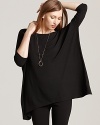 Drape this Eileen Fisher dress with an asymmetric neckline over tights and tall boots for effortless cool-weather chic.