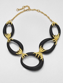 From the Lucite Allegory Collection. Sleek links of hand-painted, hand-sculpted Lucite are dramatically connected by tendril-like flowers of textured goldtone in this simply stunning design.LuciteGoldtoneChain length, about 16 plus 3 extenderLobster claspMade in USA From the Lucite Allegory Collection. Sleek links of hand-painted, hand-sculpted Lucite are dramatically connected by tendril-like flowers of textured goldtone in this simply stunning design.LuciteGoldtoneChain length, about 16 plus 3 extenderLobster claspMade in USA