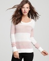 Relaxed sophistication starts with this GUESS sweater, boasting bold, graphic stripes.