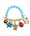 Head to the boardwalk in Betsey style! Betsey Johnson's beach-ready stretch bracelet features a blue faceted bead stretch chain, crystal-accented gold tone turtle, turquoise starfish, blue oyster with glass pearl, pink faceted teardrop crystal, crab with glass pearl accent and glass pearl beads. Set in gold tone mixed metal. Approximate length: 7-1/2 inches. Approximate drop: 1-1/2 inches
