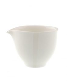 Make a chic style statement with the Dune Lines creamer. The distinctive, free form shape, soft lines and ribbed surface combine for truly modern elegance. An imperfect glaze conveys natural grace. Make a chic style statement with the Dune Lines creamer. The distinctive, free form shape, soft lines and ribbed surface combine for truly modern elegance. An imperfect glaze conveys natural grace.
