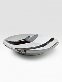 An inspired piece of artisanal stoneware with hand-brushed lines that recall Japanese folk art. From the Mashiko Collection Glazed stoneware About 10 diam. Hand wash Handmade in Japan An inspired piece of artisanal stoneware with hand-brushed lines that recall Japanese folk art. From the Mashiko Collection Glazed stoneware About 10 diam. Hand wash Handmade in Japan