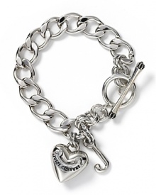 Silvertone chain charm bracelet with toggle closure. Iconic heart with Juicy script J charm.