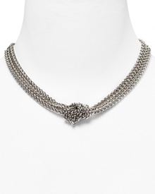 A chic silver-plated necklace with three braided rows and a chunky knot to cinch the look.