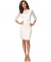 Channel the glamour of old Hollywood in this fitted, belted sheath from Alex Evenings. The classic shape of this white dress is enhanced with an eternally-chic scalloped lace overlay.