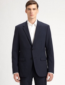 A modern-fitting classic, handsomely tailored with clean lines and a two-button front. Notch lapel Single back vent About 29½ from shoulder to hem 96% Italian wool/4% Lycra; dry clean Imported A modern-fitting classic, handsomely tailored with clean lines and a two-button front. Notch lapel Single back vent About 29½ from shoulder to hem 96% Italian wool/4% Lycra; dry clean Imported