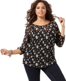 A darling polka dot print highlights INC's long sleeve plus size peasant top-- finish the look with your favorite casual bottoms.