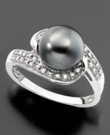 Indulge in intrigue. This spectacular ring features a dark cultured Tahitian pearl (7mm) and round-cut diamonds (1/8 ct. t.w.) set in 14k white gold. Indulge in intrigue. This spectacular ring features a dark cultured Tahitian pearl (7mm) and round-cut diamonds (1/8 ct. t.w.) set in 14k white gold.