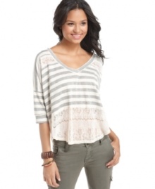 Eyeshadow gives this casual striped top a touch of romance with inset lace at the shoulders and from waist to hem. Eyeshadow gives this casual striped top a touch of romance with inset lace at the shoulders and from waist to hem.