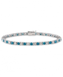 Polish and a pop of color. B. Brilliant's pretty tennis bracelet features alternating London blue cubic zirconias and clear cubic zirconias (5 ct. t.w.) set in sterling silver. Approximate length: 7-1/2 inches.