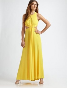 Fluid knit jersey in a floor-length design, accented with sexy side cutouts.Jewel necklineSleevelessSide cutoutsTwist-front detail with front drapeCriss-crossing back strapsConcealed back zipAbout 43¾ from natural waistPolyesterDry cleanImportedModel shown is 5'10 (177cm)wearing US size Small. Fluid knit jersey in a floor-length design, accented with sexy side cutouts.Jewel necklineSleevelessSide cutoutsTwist-front detail with front drapeCriss-crossing back strapsConcealed back zipAbout 43¾ from natural waistPolyesterDry cleanImportedModel shown is 5'10 (177cm)wearing US size Small.